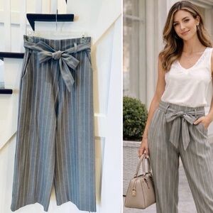 H&M High-Rise Tie-Waist Striped Wide-Leg Pants - Gray and white stripes.